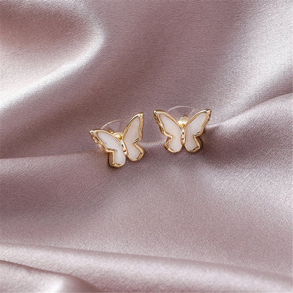 Shell and 18K Gold-Plated Butterfly Stud Earrings, gold stud earrings for women, dainty minimalist design, detail close-up