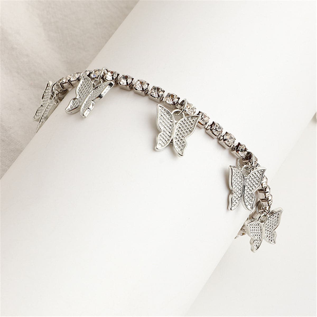 Cubic Zirconia and Silver-Plated Butterfly Station Anklet, silver anklet bracelet, everyday style, detail close-up