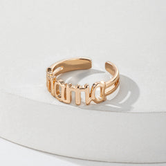 Beautiful 18K gold-plated ring with "Mom" inscribed, showcasing a stunning rose gold finish for a special touch.