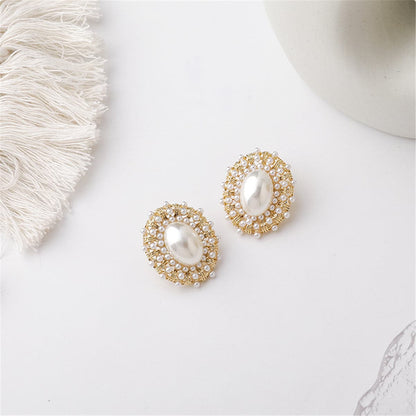 Pearl and 18K Gold-Plated Oval Stud Earrings, gold stud earrings for women, botanical inspired, detail close-up