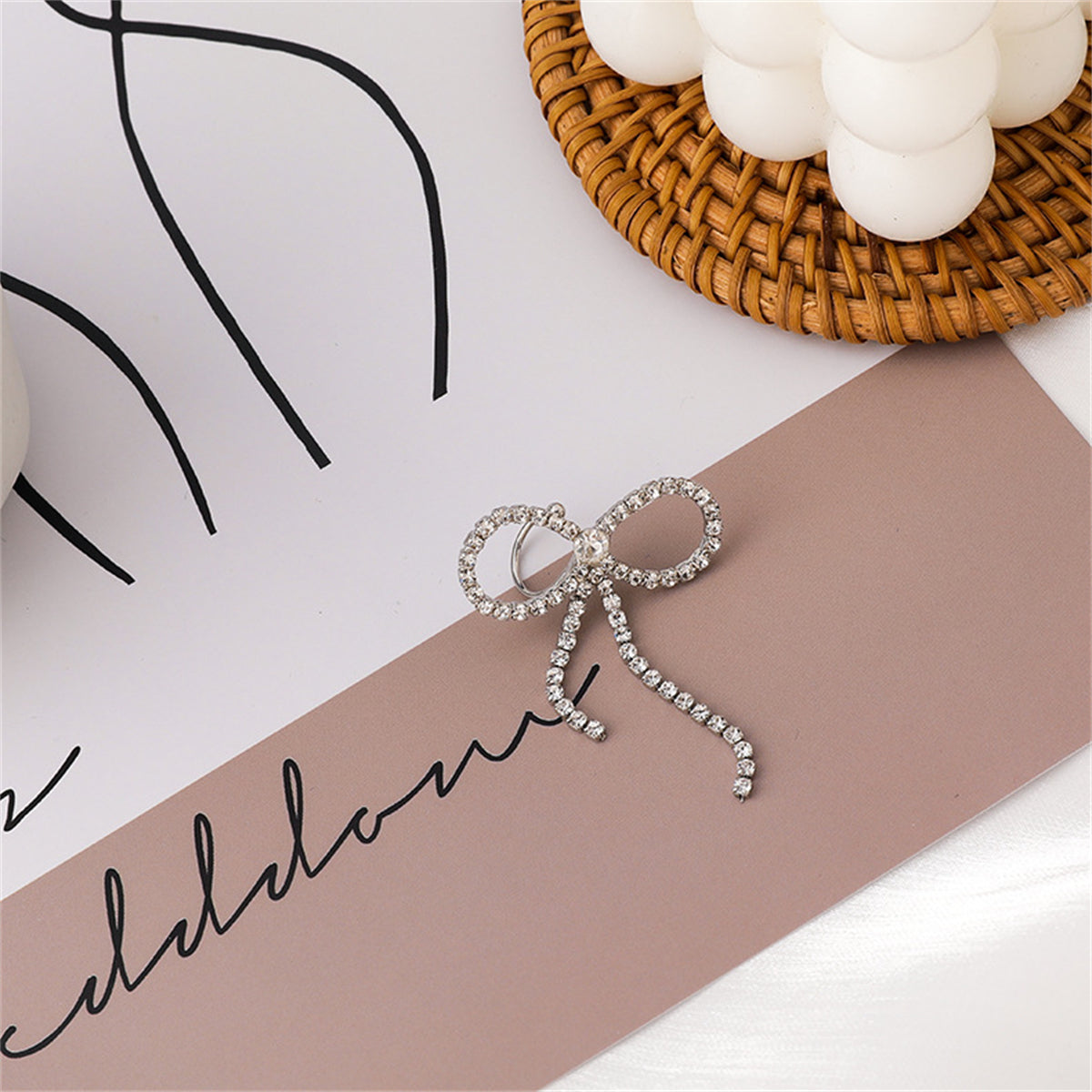 Cubic Zirconia and Silver-Plated Bow Ribbon Ear Cuff, silver drop earrings for women, elegant gift for her, side view