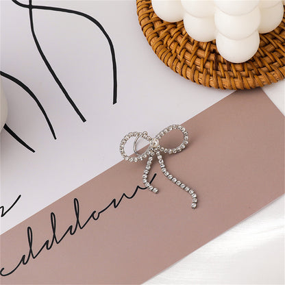 Cubic Zirconia and Silver-Plated Bow Ribbon Ear Cuff, silver drop earrings for women, elegant gift for her, side view