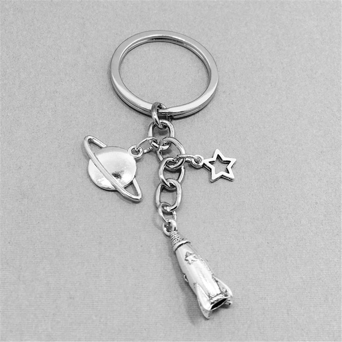 Silver-Plated Rocket Key Chain, silver pendant necklace for women, botanical inspired, lifestyle look