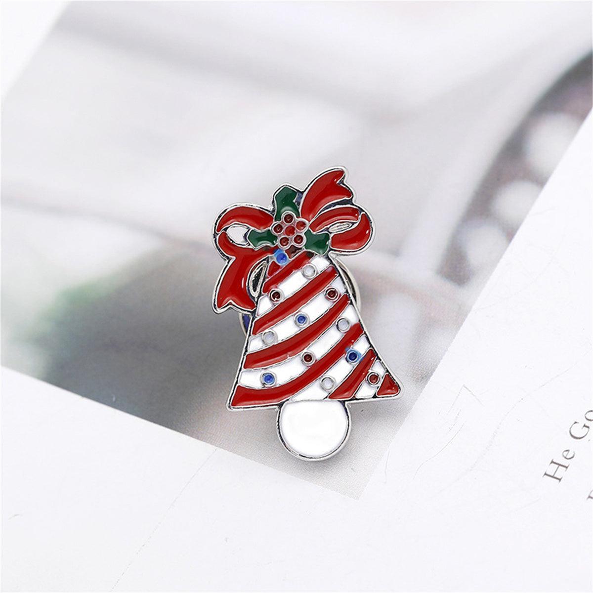 Red and White Enamel Stripe Christmas Bell Brooch, brooch pin, botanical inspired, front view