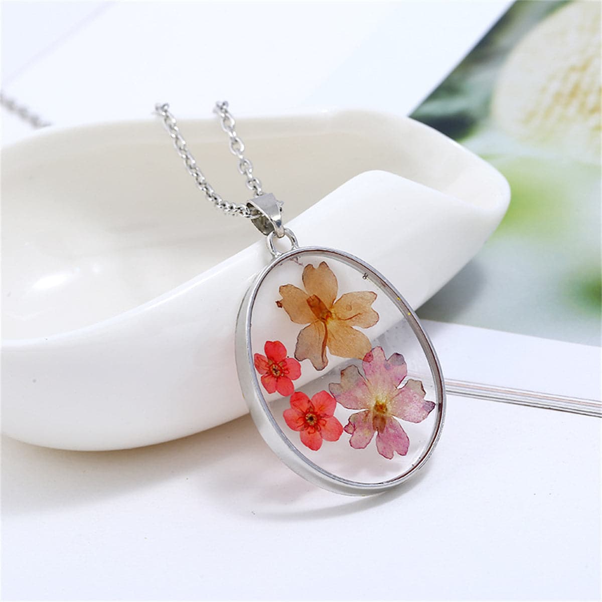Pink and Red Pressed Flower Oval Pendant Necklace, pendant necklace for women, vintage-inspired design, front view