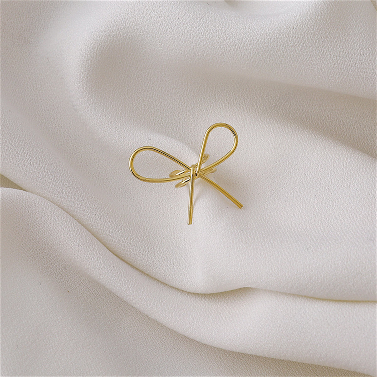 18K Gold-Plated Bow Ear Cuff, gold stud earrings for women, vintage-inspired design, front view