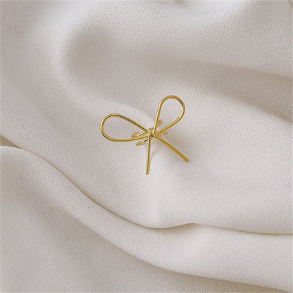 18K Gold-Plated Bow Ear Cuff, gold stud earrings for women, vintage-inspired design, front view
