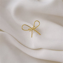 Elegant 18K gold-plated bow ring featuring two beautifully twisted ends, perfect for adding a touch of sophistication.
