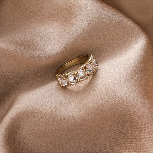 Cubic Zirconia and Crystal 18K Gold-Plated Round-Cut Channel Band Ring, gold statement rings for women, front view