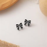 Pearl & Black Enamel Silver-Plated Bow Stud Earrings
