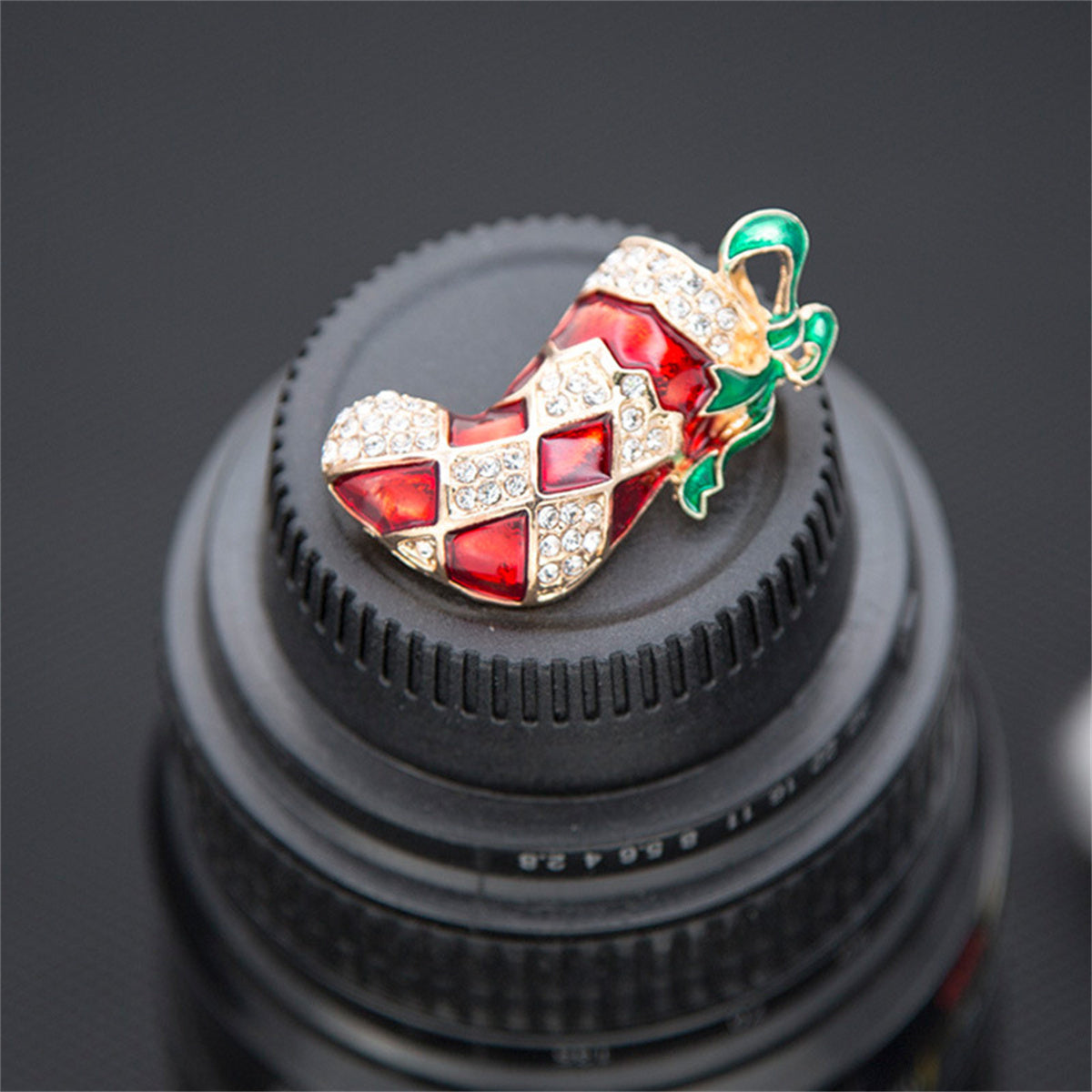 Red Enamel and Cubic Zirconia Christmas Stocking Brooch, brooch pin, botanical inspired, side view
