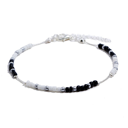 Black Acrylic and Silver-Plated Bead Anklet, silver anklet bracelet, dainty minimalist design, side view