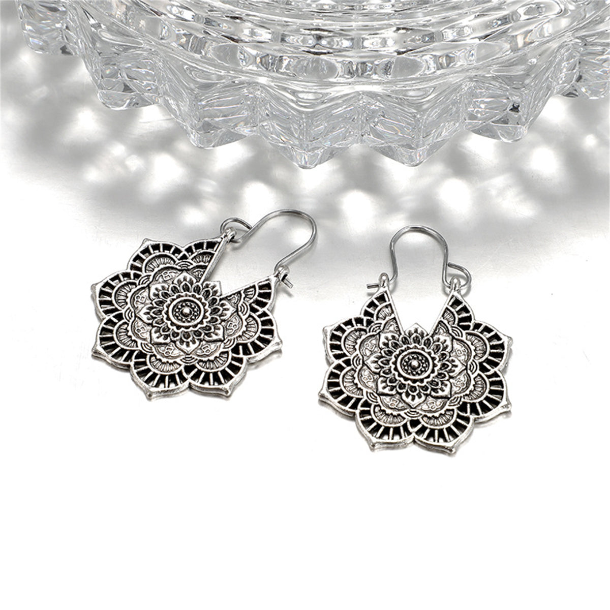 Silver-Plated Floral Huggie Earrings, silver huggie earrings, botanical inspired, front view
