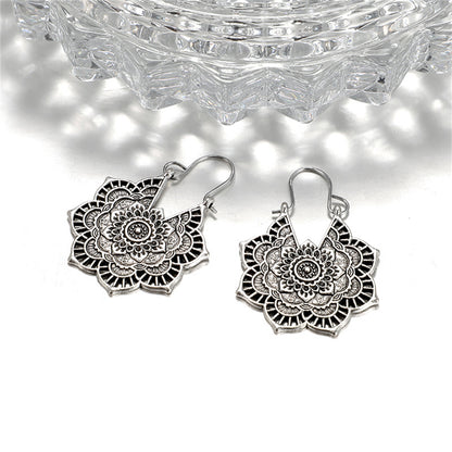 Silver-Plated Floral Huggie Earrings, silver huggie earrings, botanical inspired, front view