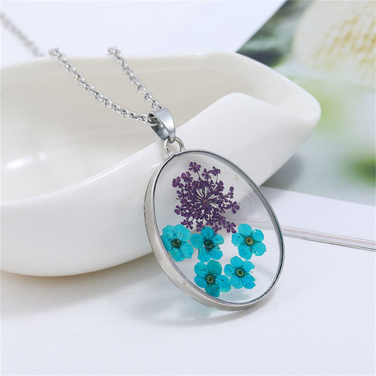 Blue Pressed Peach Blossom and Silver-Plated Oval Pendant Necklace, silver pendant necklace for women, front view