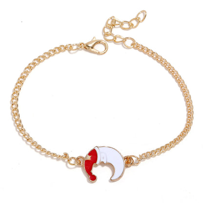 Red Enamel and 18K Gold-Plated Crescent Moon Santa Pendant Necklace Set, gold drop earrings for women, detail close-up