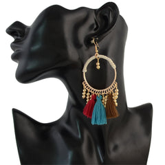 Eye-catching 18K gold-plated hoop earrings with multi-colored tassels, a perfect blend of elegance and fun.