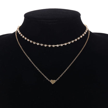 Cubic Zirconia and 18K Gold-Plated Heart Layered Necklace, gold pendant necklace for women, botanical inspired, front view