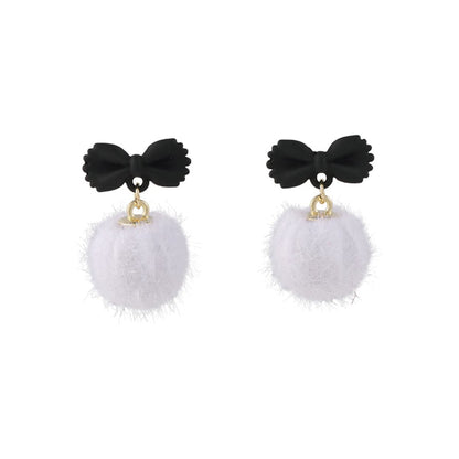 Black Enamel and White Pom-Pom Bow Drop Earrings, drop earrings for women, vintage-inspired design, side view