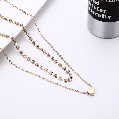 Cubic Zirconia and 18K Gold-Plated Heart Layered Necklace, gold pendant necklace for women, botanical inspired, side view