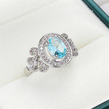 Cubic Zirconia and Sea Blue Crystal Halo Butterfly Ring, statement rings for women, botanical inspired, front view