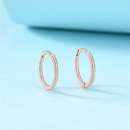 18K Rose Gold-Plated Textured Huggie Earrings, rose gold huggie earrings, vintage-inspired design, side view