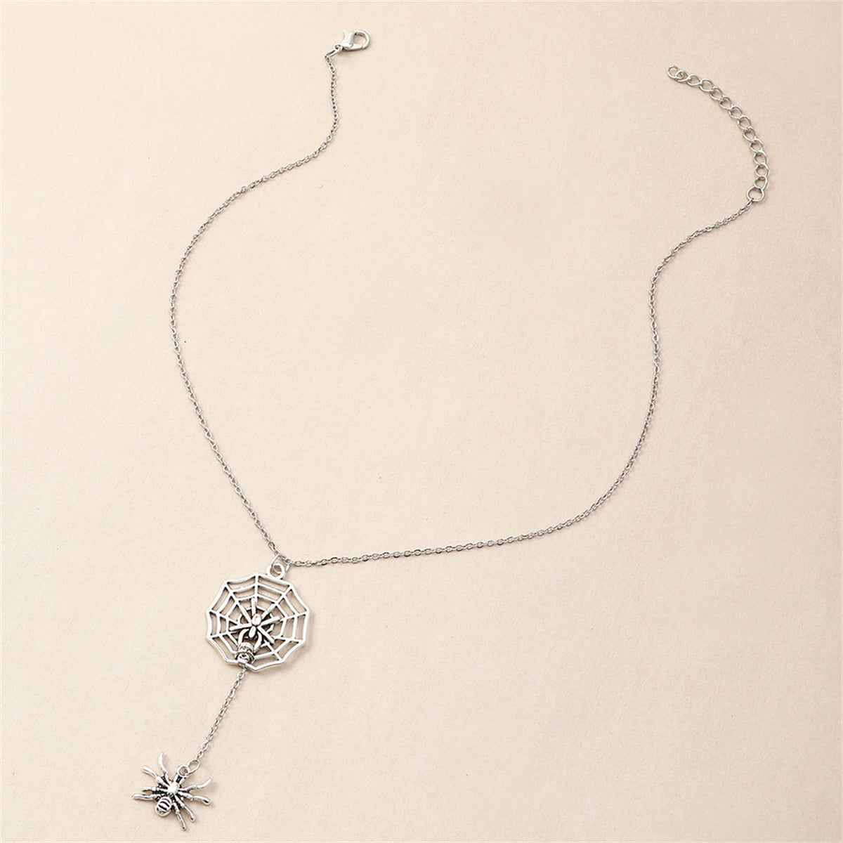 Silver-Plated Spider and Web Drop Necklace, silver pendant necklace for women, botanical inspired, detail close-up