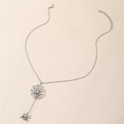 Silver-Plated Spider and Web Drop Necklace, silver pendant necklace for women, botanical inspired, detail close-up
