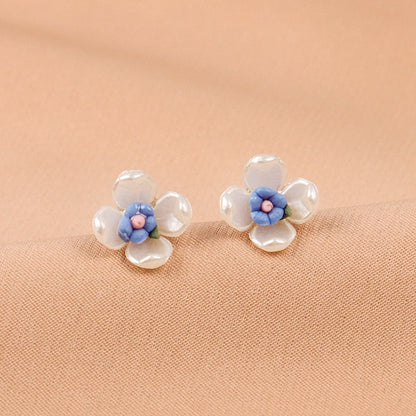 Blue Acrylic and 18K Gold-Plated Floral Stud Earrings, gold stud earrings for women, botanical inspired, front view