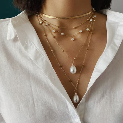 Pearl and 18K Gold-Plated Layered Necklace, gold pendant necklace for women, dainty minimalist design, front view