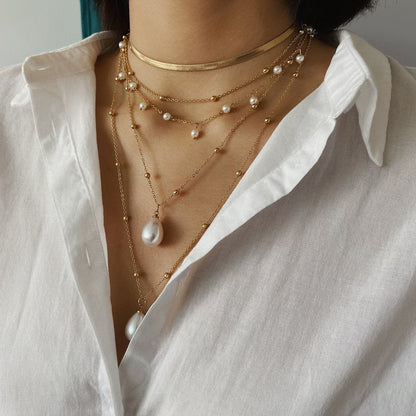 Pearl and 18K Gold-Plated Layered Necklace, gold pendant necklace for women, dainty minimalist design, side view