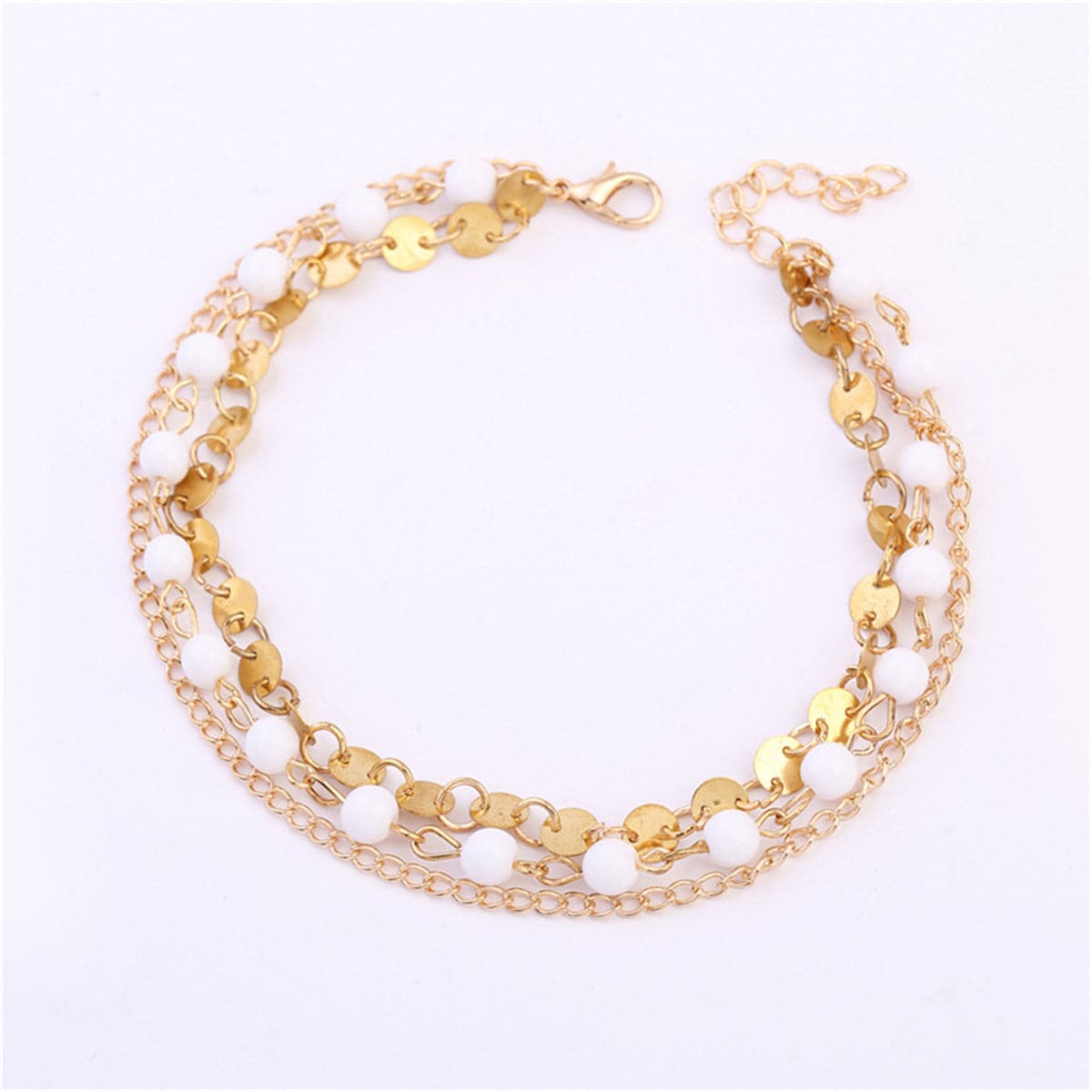 Chic 18K gold-plated anklet showcasing a gold chain interspersed with white beads, ideal for stylish accessorizing.