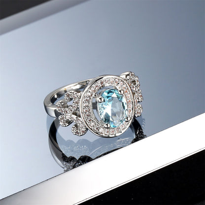 Cubic Zirconia and Sea Blue Crystal Halo Butterfly Ring, statement rings for women, botanical inspired, styled look
