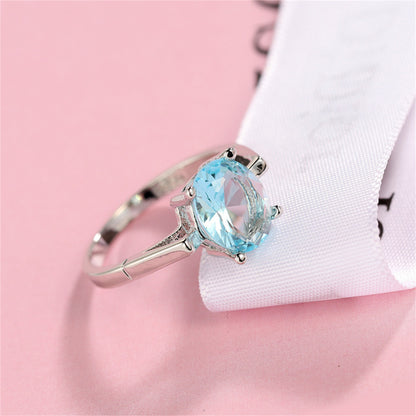Sea Blue Crystal and Silver-Plated Openwork Geometric Oval-Cut Ring, silver statement rings for women, lifestyle look