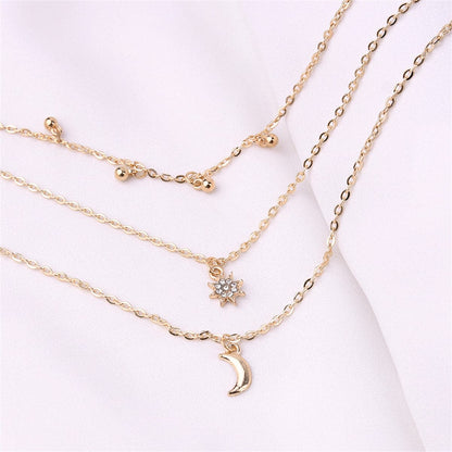 Cubic Zirconia and 18K Gold-Plated Stars Moon Layered Necklace, gold pendant necklace for women, side view