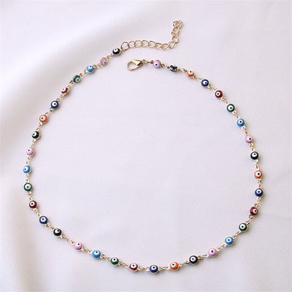 Blue Enamel and 18K Gold-Plated Multi-Hued Evil Eye Necklace, gold pendant necklace for women, detail close-up