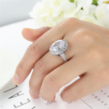 Crystal and Cubic Zirconia Silver-Plated Halo Oval-Cut Ring, silver statement rings for women, everyday style, styled look