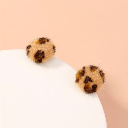 Gabardine and Silver-Plated Leopard Print Stud Earring, silver stud earrings for women, botanical inspired, detail close-up
