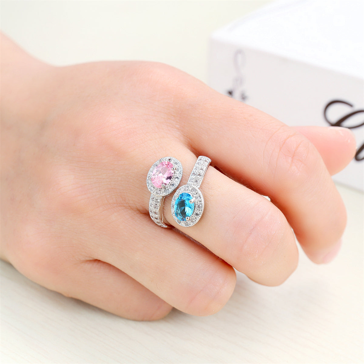 Pink and Blue Crystal Oval-Cut Bypass Ring, statement rings for women, botanical inspired, front view