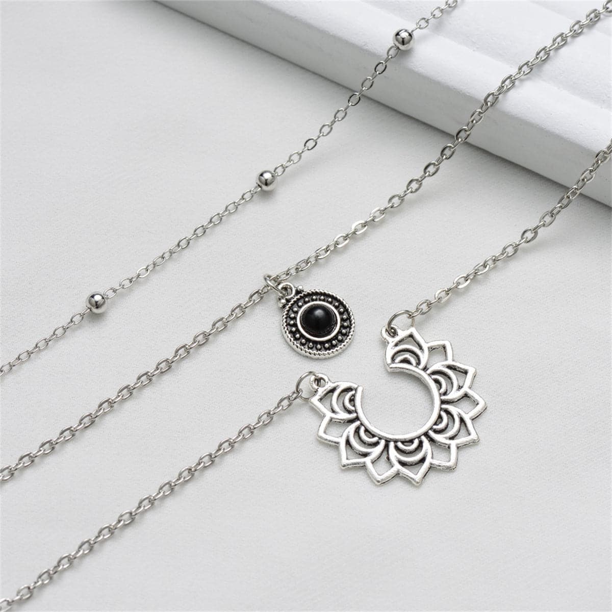 Black Resin and Silver-Plated Sunflower Layered Pendant Necklace, chunky silver choker necklace, lifestyle look