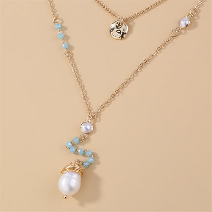 Pearl and Acrylic 18K Gold-Plated Layered Beaded Drop Necklace, gold pendant necklace for women, detail close-up