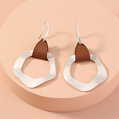 Brown Polyurethane and Silver-Plated Drop Earrings, silver drop earrings for women, botanical inspired, side view