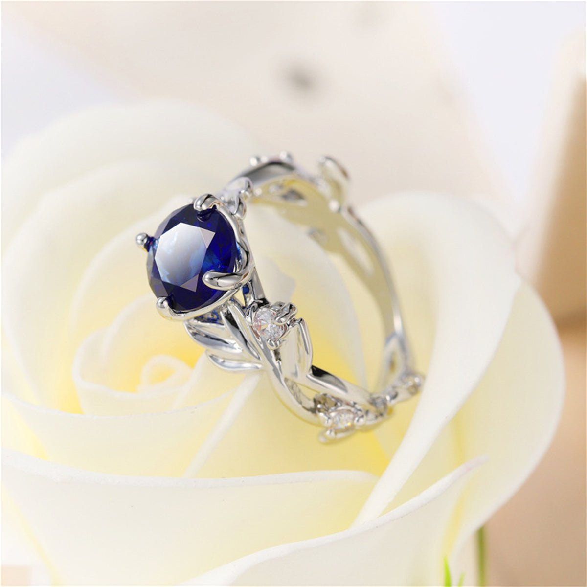Navy Crystal and Silver-Plated Round-Cut Floral Ring, silver statement rings for women, botanical inspired, front view