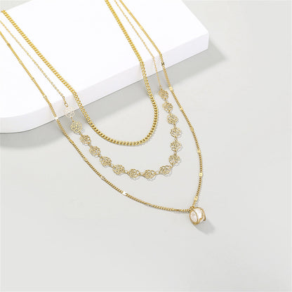 Pearl and 18K Gold-Plated Lotus Layered Station Necklace, gold pendant necklace for women, detail close-up