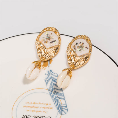 Shell and 18K Gold-Plated Pukka Shell Drop Earrings, gold drop earrings for women, vintage-inspired design, lifestyle look