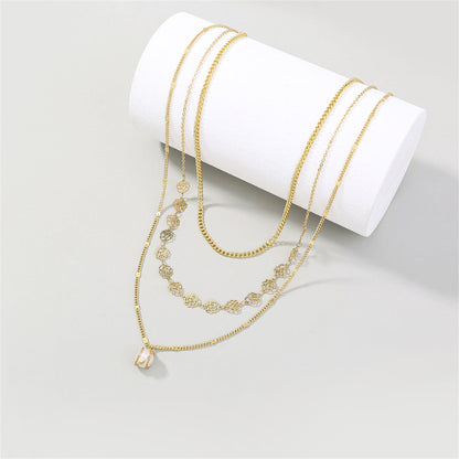 Pearl and 18K Gold-Plated Lotus Layered Station Necklace, gold pendant necklace for women, lifestyle look