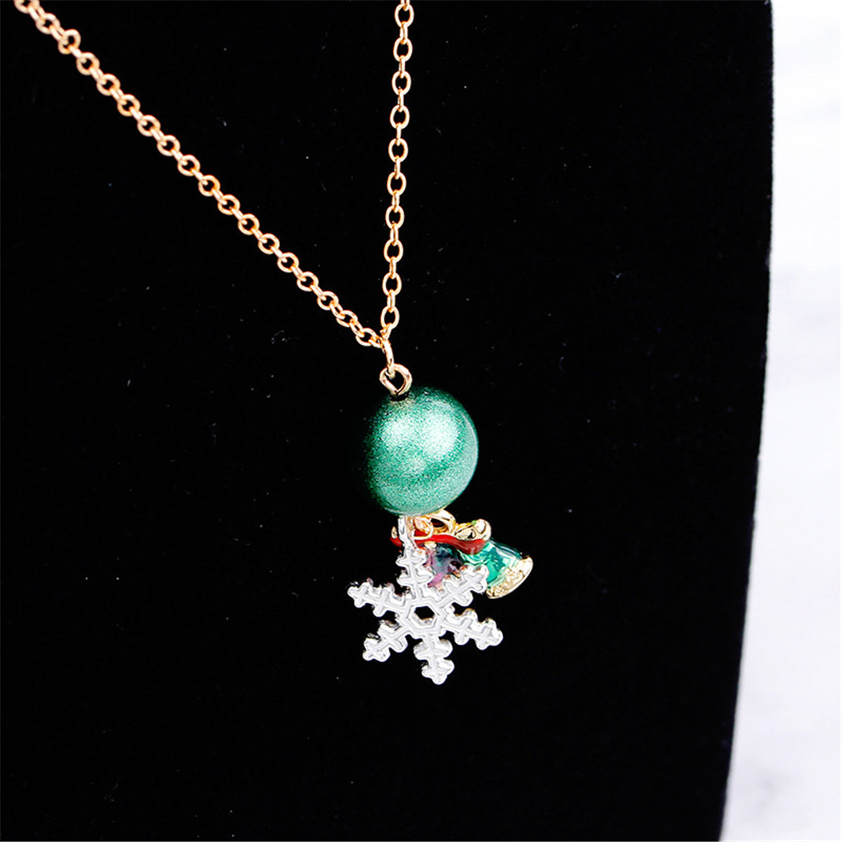 Green and 18K Gold-Plated Snowflake Bells Pendant Necklace, gold pendant necklace for women, detail close-up