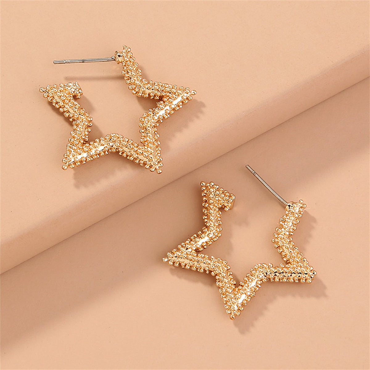 18K Gold-Plated Open Star Huggie Earrings, gold huggie earrings, vintage-inspired design, detail close-up