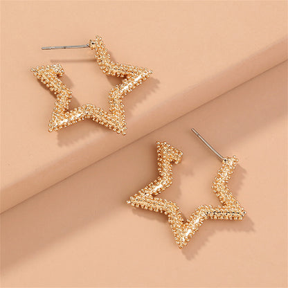 18K Gold-Plated Open Star Huggie Earrings, gold huggie earrings, vintage-inspired design, detail close-up