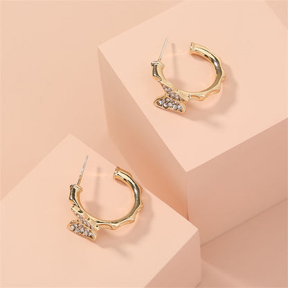 Cubic Zirconia and 18K Gold-Plated Butterfly Huggie Earrings, gold huggie earrings, everyday style, side view